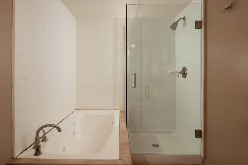 Suite, 1 Bedroom | Bathroom | Combined shower/tub, designer toiletries, hair dryer, towels