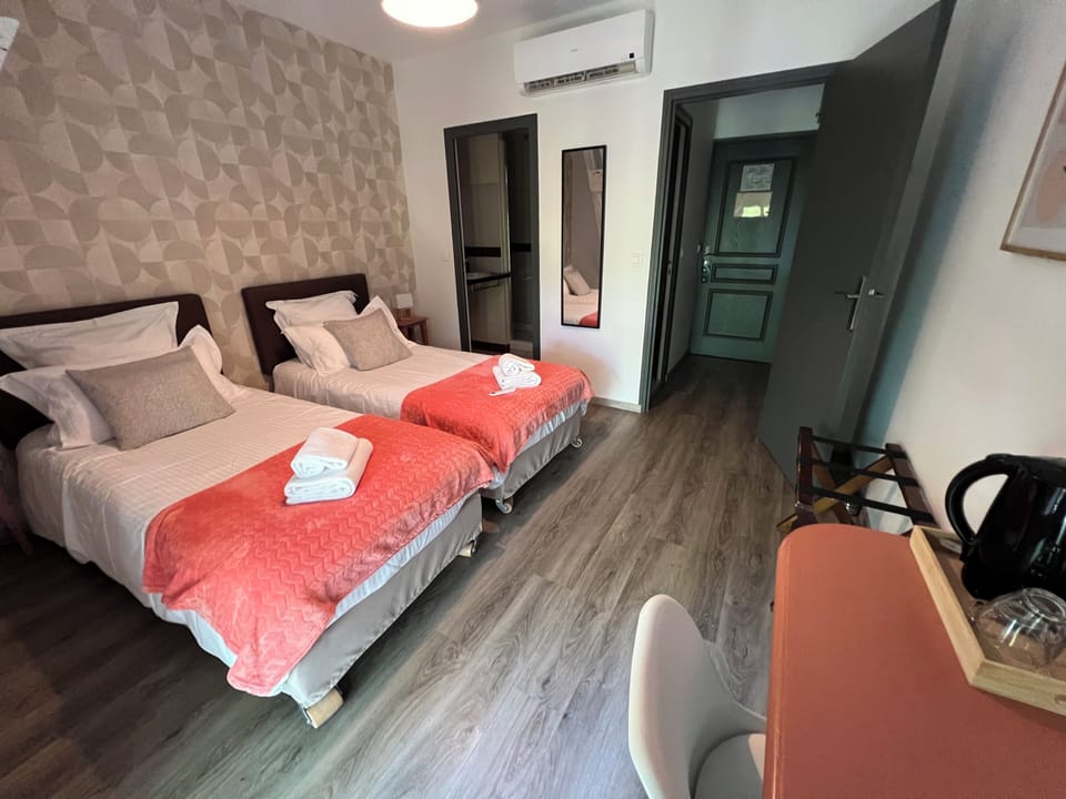Twin Room | Desk, blackout drapes, soundproofing, iron/ironing board