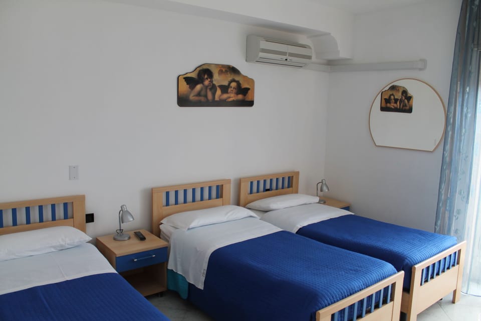 Pillowtop beds, desk, laptop workspace, iron/ironing board