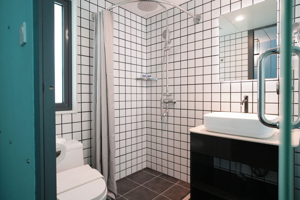Shower, free toiletries, hair dryer, bathrobes