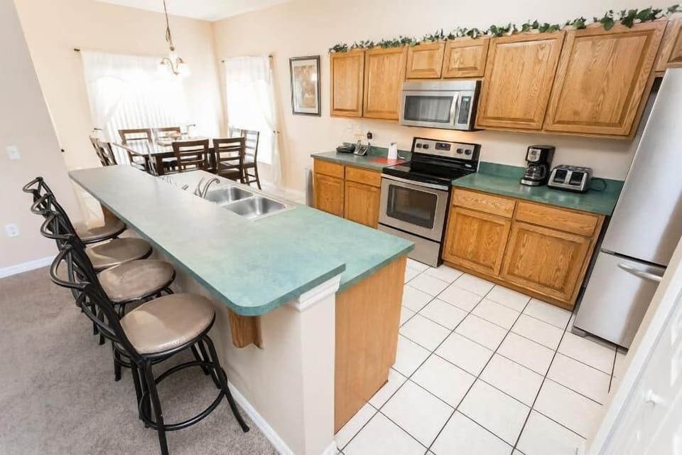 Kitchen area with stainless apliances