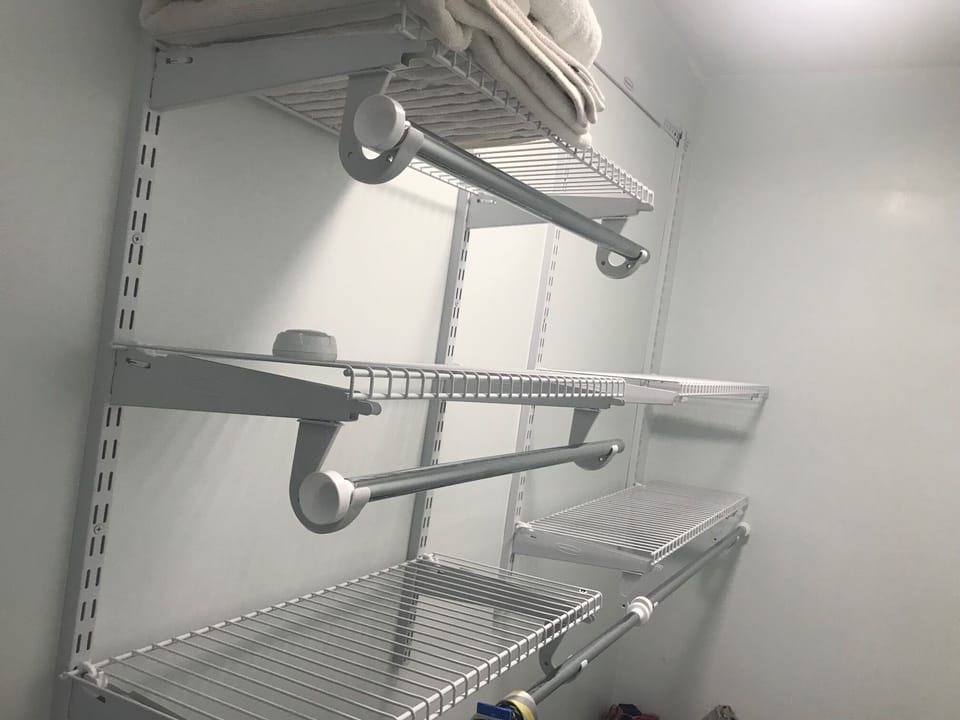 Walk- in closet. Extra towels and Iron, board and handheld steamer provided. 