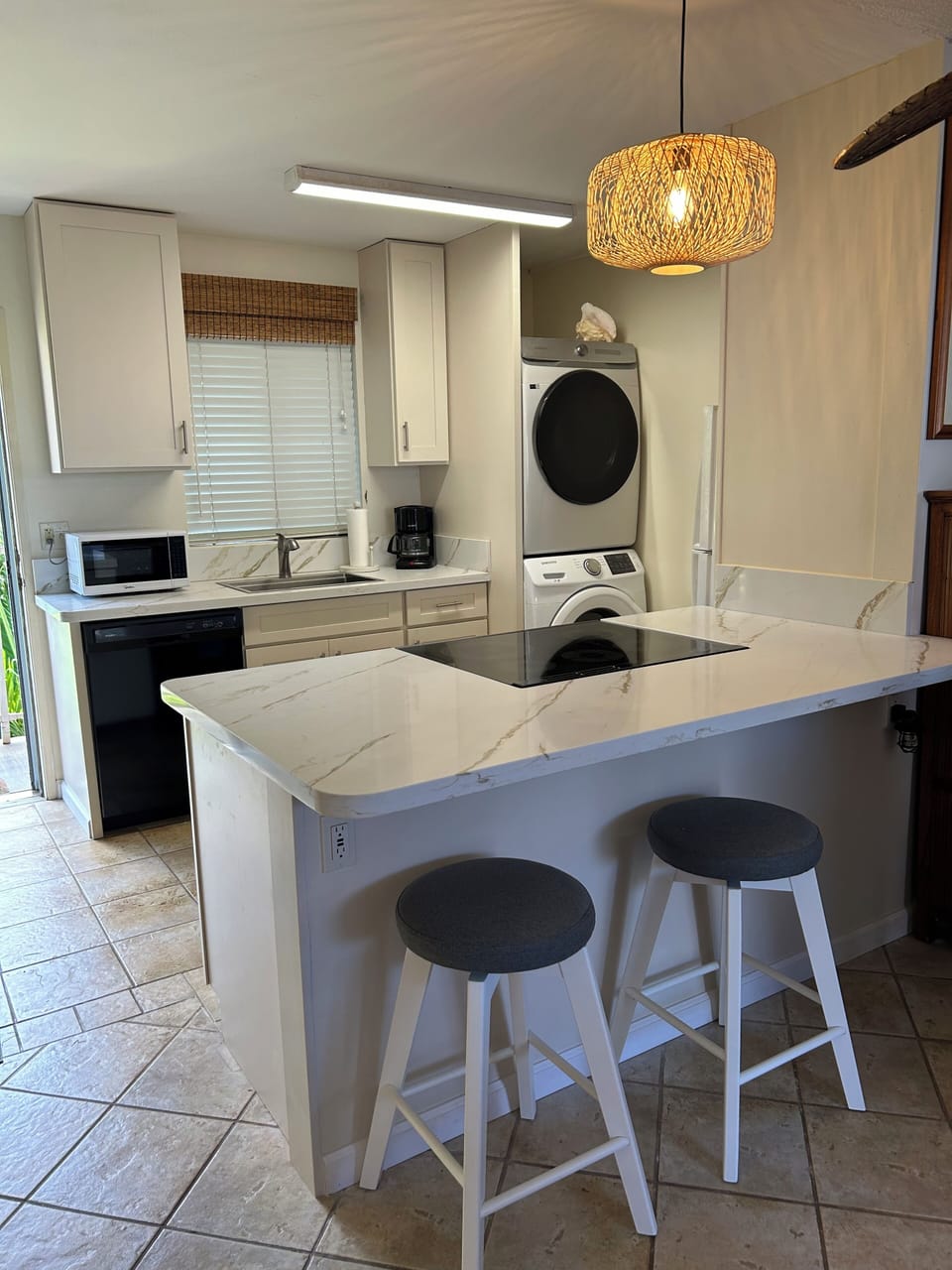Newly remodeled peninsula kitchen  new appliances, cabinetry granite countertops