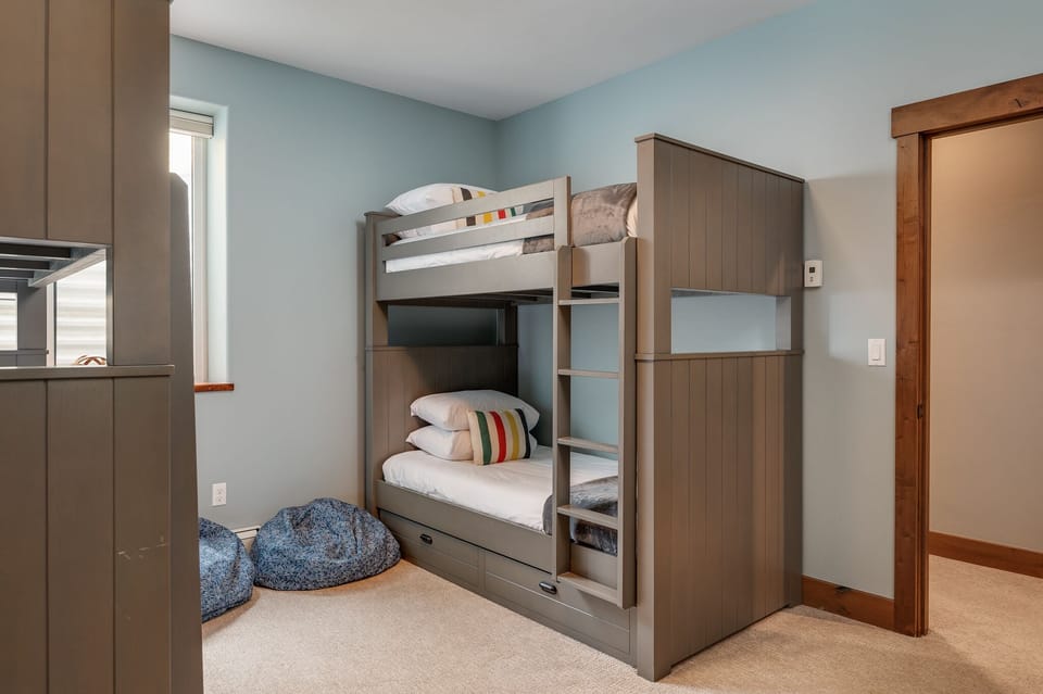 Hotel-style luxury linens in the bunk room