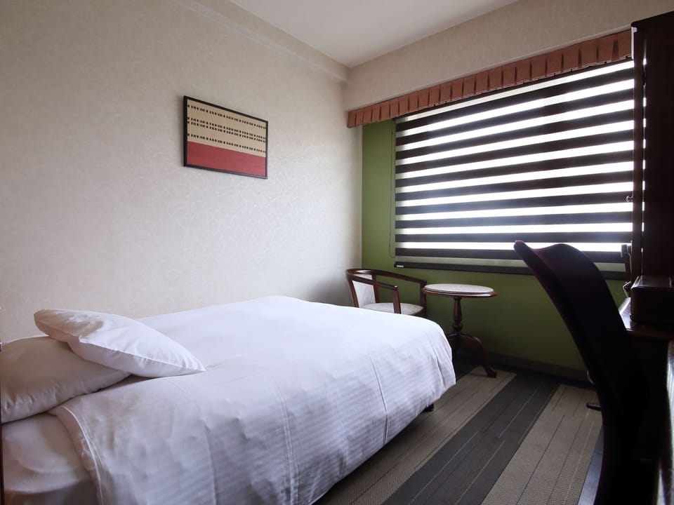Premium bedding, down comforters, desk, blackout drapes