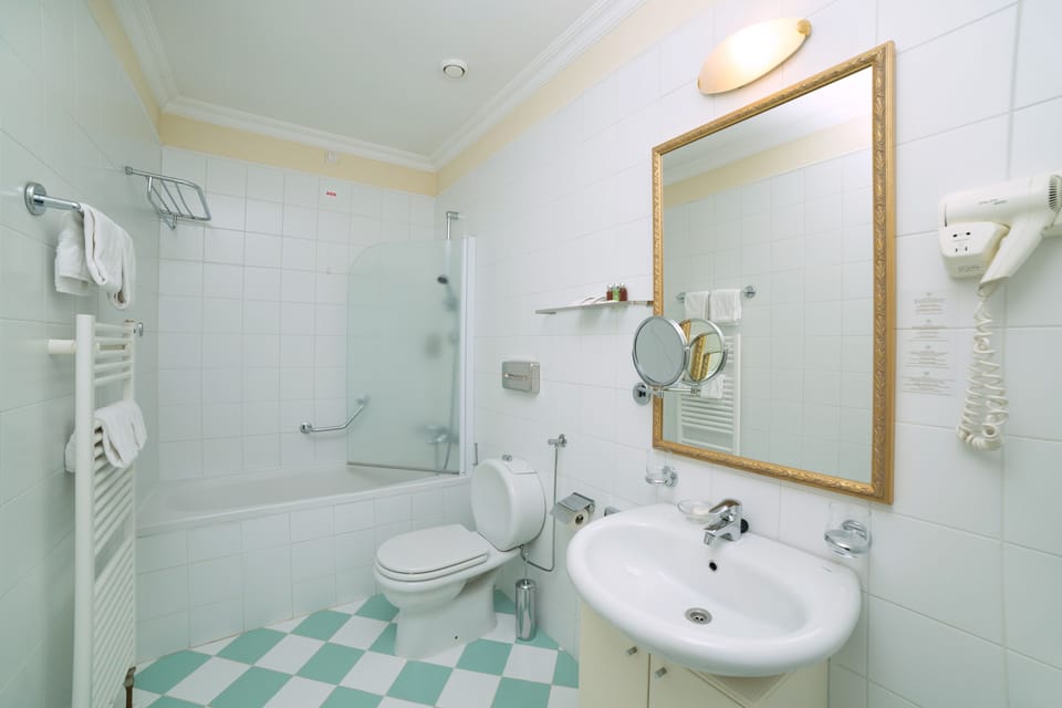 Shower, hair dryer, soap, shampoo