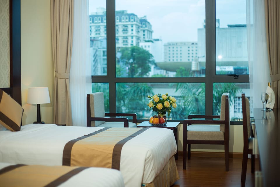 Deluxe Double Room | Minibar, in-room safe, desk, blackout drapes