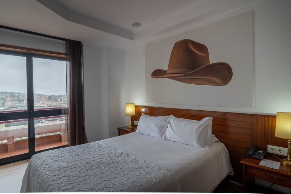 Family Quadruple Room, Non Smoking | Minibar, in-room safe, individually decorated, desk