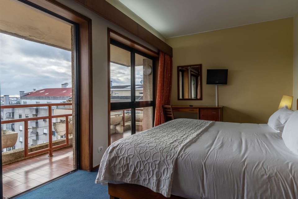 Standard Double Room, 1 Queen Bed | Minibar, in-room safe, individually decorated, desk