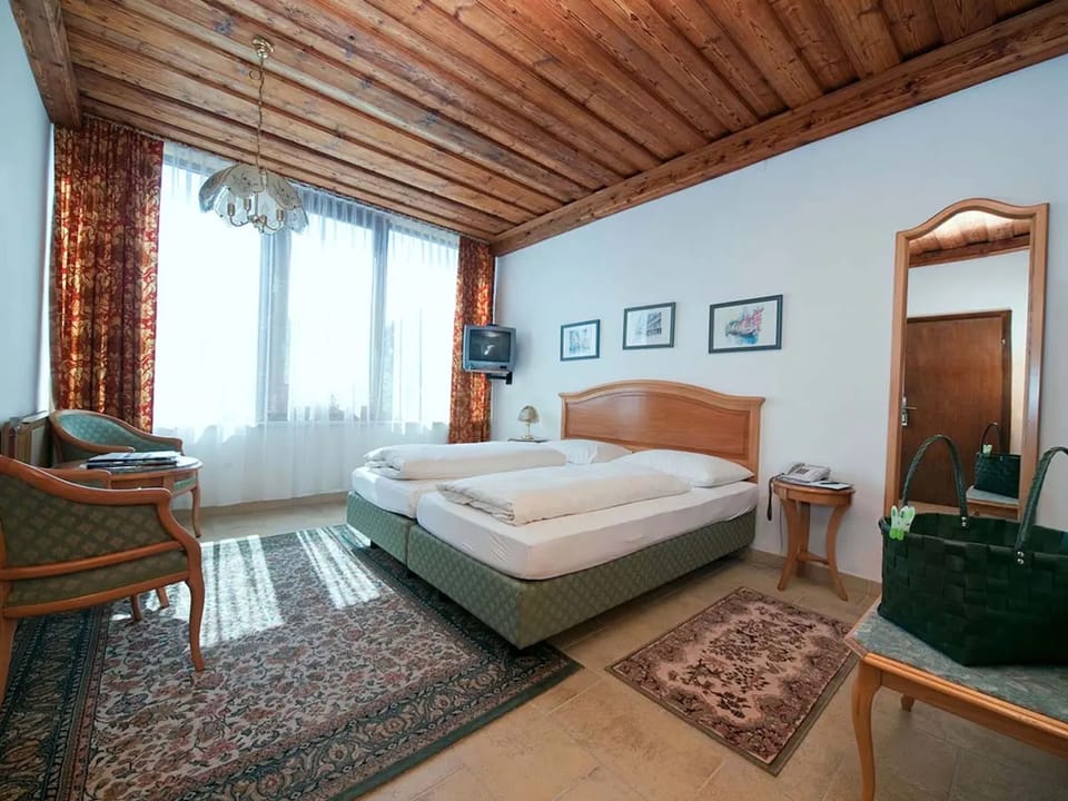 Standard Apartment | Minibar, in-room safe, WiFi (free), individually decorated