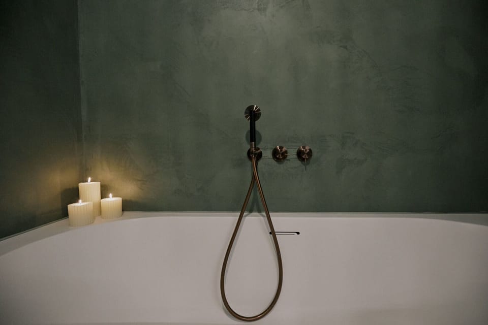 Design Studio Suite, 1 King Bed, Garden Area | Bathroom | Designer toiletries, hair dryer, bathrobes, slippers
