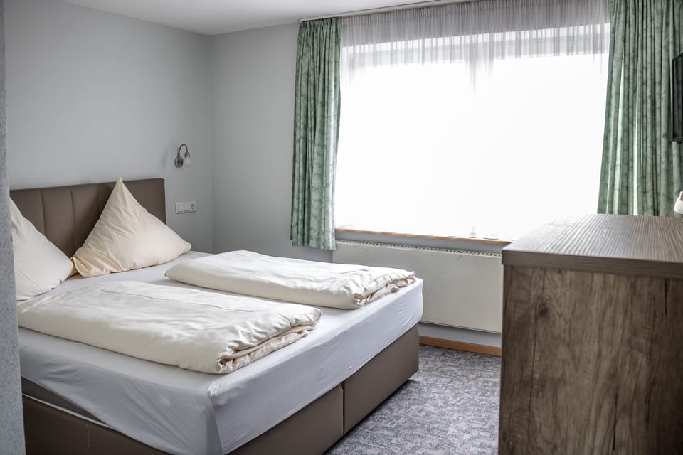 Standard Double Room, Private Bathroom | Desk, WiFi (free), bed sheets