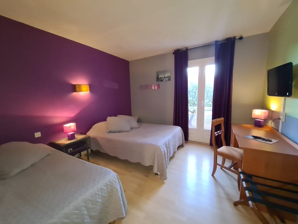 Room | Premium bedding, desk, blackout drapes, soundproofing