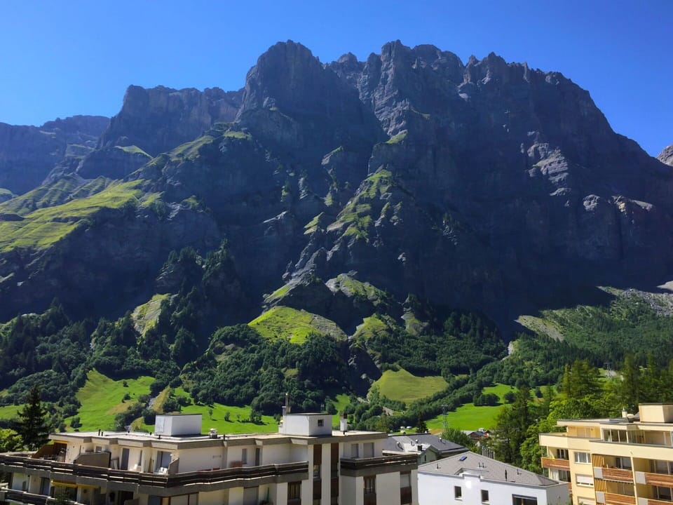 Sky, Mountain, Building, Natural Landscape, Highland, Vegetation, Tree, Biome, Terrain