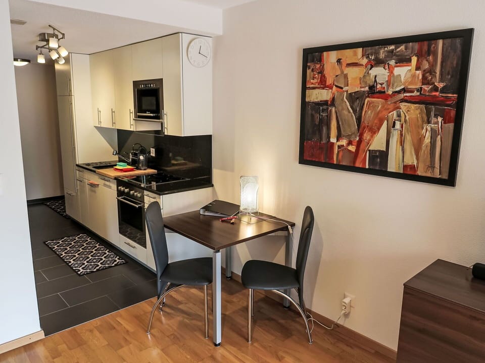Property, Furniture, Picture Frame, Table, Wood, Interior Design, Flooring, Floor, Wall, Building