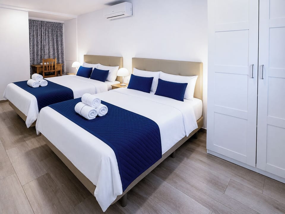 Quadruple Room | Pillowtop beds, soundproofing, WiFi (free), bed sheets