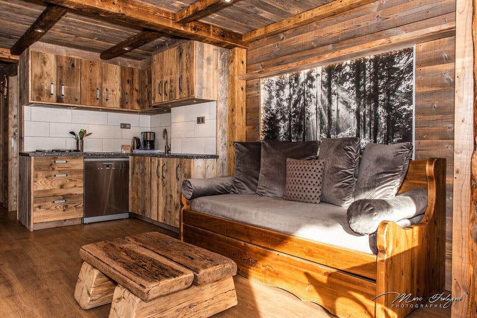 Salon séjour décoration montagne bois locations appartement La Bresse Hohneck Vosges