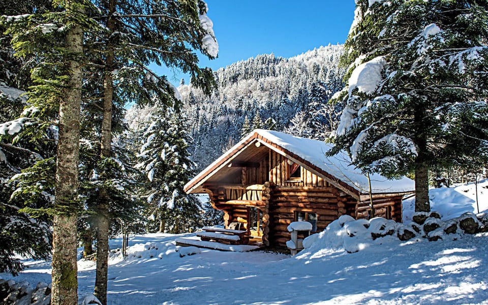 Chalet en rondin hiver neige la Bresse Vosges