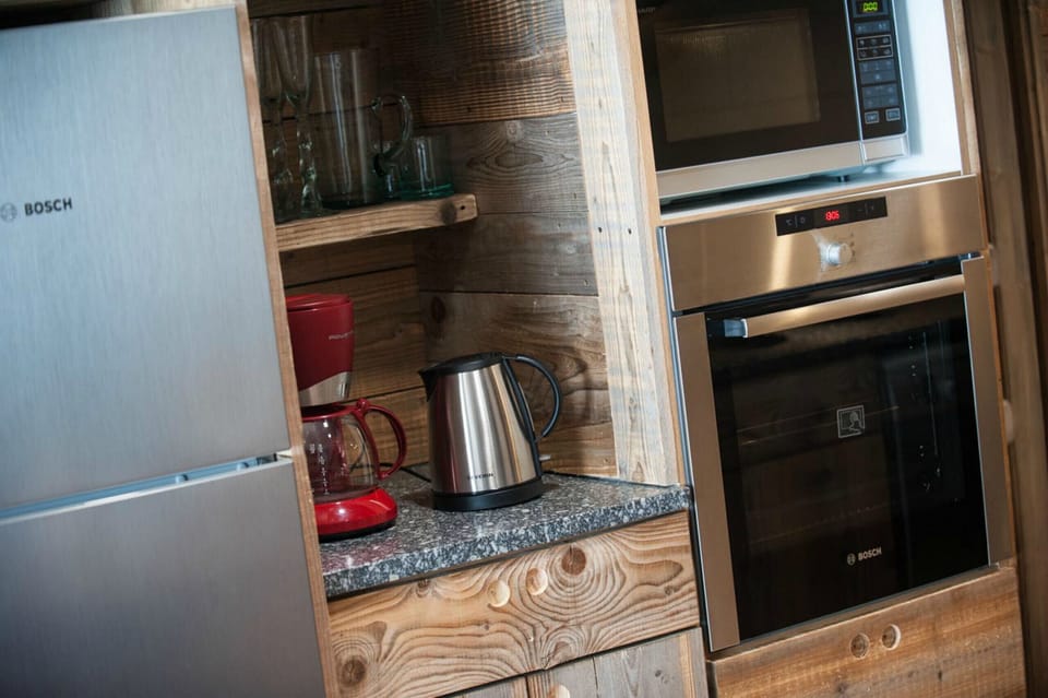 Cuisine équipée appartement location Vosges La Bresse rivière montagne