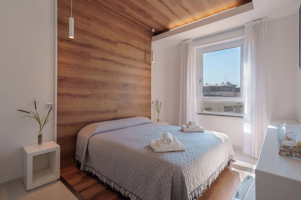 Premium bedding, down comforters, memory foam beds, desk