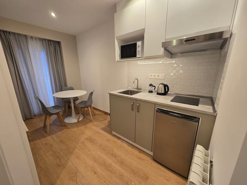 Studio | Living area | 32-inch TV with digital channels
