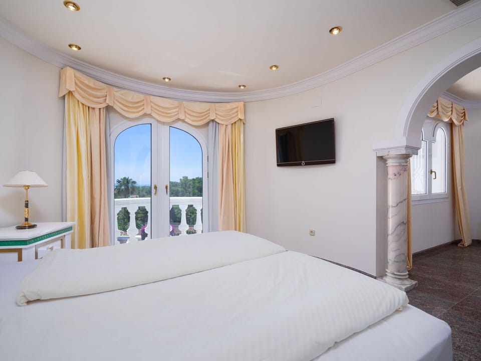 Furniture, Building, Property, Window, Comfort, Azure, Cabinetry, Bed Frame, Shade, Plant