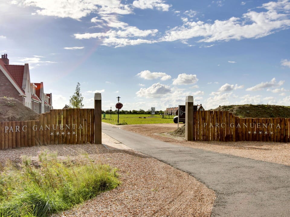 Sky, Wall, Daytime, Cloud, Property, Grass, Residential Area, Town, Tree, Road