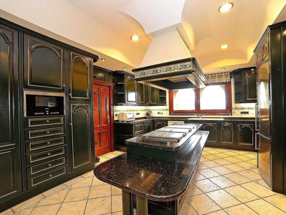 Cabinetry, Furniture, Countertop, Property, Kitchen, Kitchen Appliance, Wood, Home Appliance, Lighting, Kitchen Stove