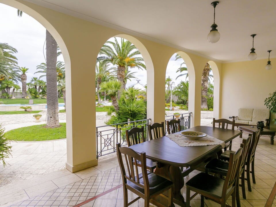 Plant, Furniture, Table, Property, Chair, Shade, Interior Design, Architecture, Building, Wood
