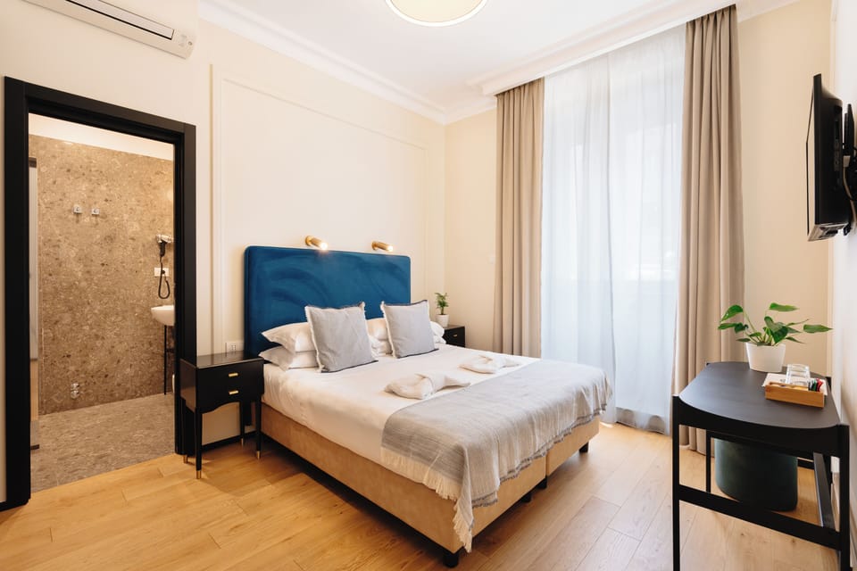 Premium bedding, down comforters, memory foam beds, minibar
