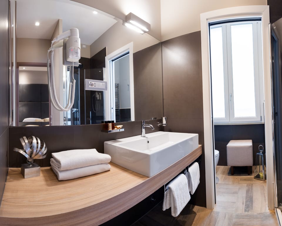 Shower, rainfall showerhead, eco-friendly toiletries, hair dryer