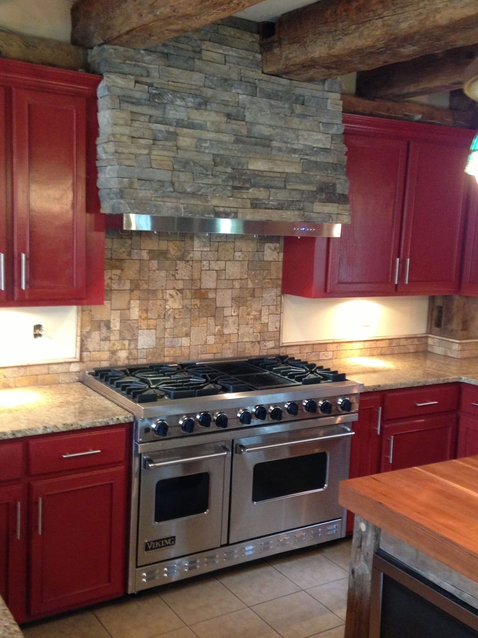 48' Viking Stove. 6 burners, a grill, and double convection ovens.