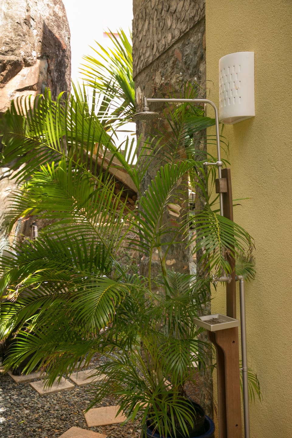 Outdoor quick rinse teak shower.  Rinse off sand after a day at the beach.