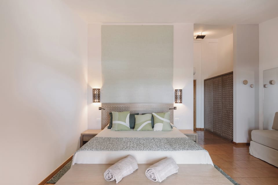Junior Triple Room, Sea View | Hypo-allergenic bedding, minibar, in-room safe, soundproofing