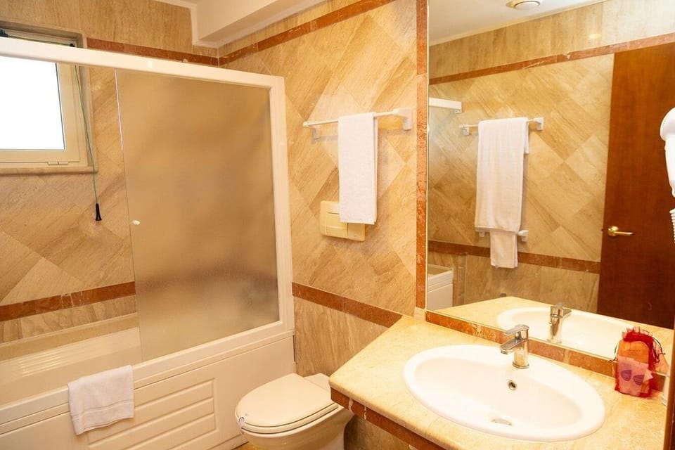 Select Comfort beds, minibar, in-room safe, desk