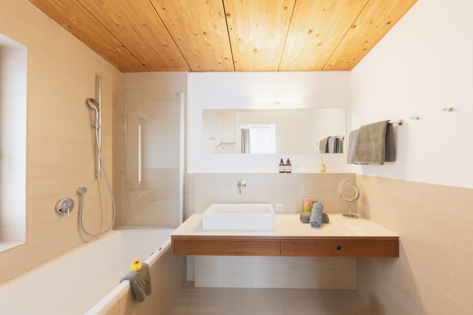 Suite, Balcony, Mountain View (Galzig) | Bathroom | Free toiletries, bathrobes, slippers, towels