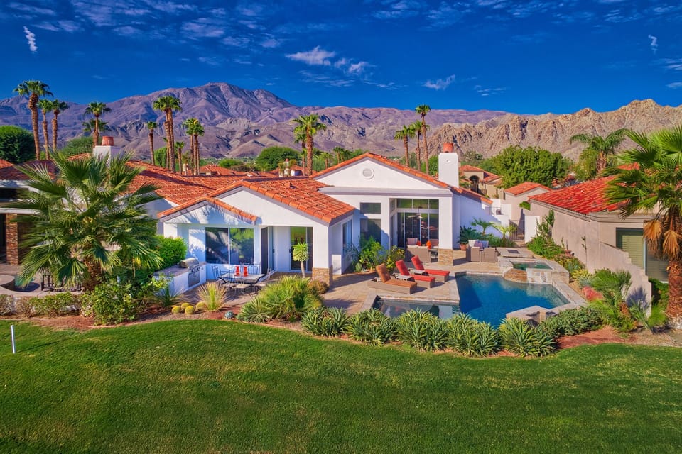 Gorgeous majestic setting with oversize pool and outdoor lounge area.  