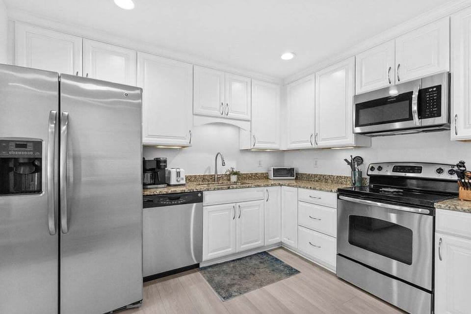 Enjoy the counter space and clean decor.