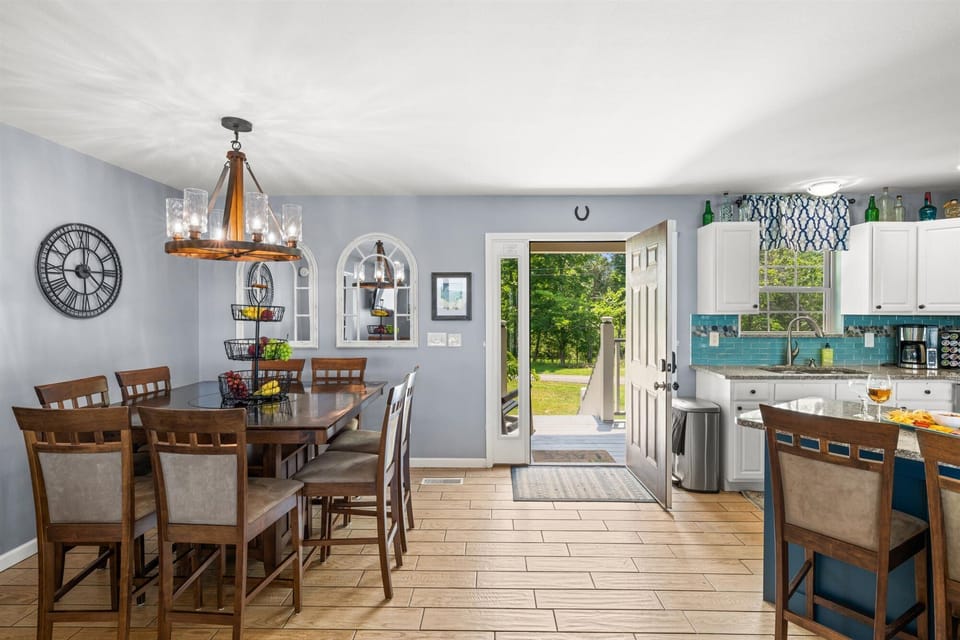 And a dining table that seats eight comfortably; additional seating at island