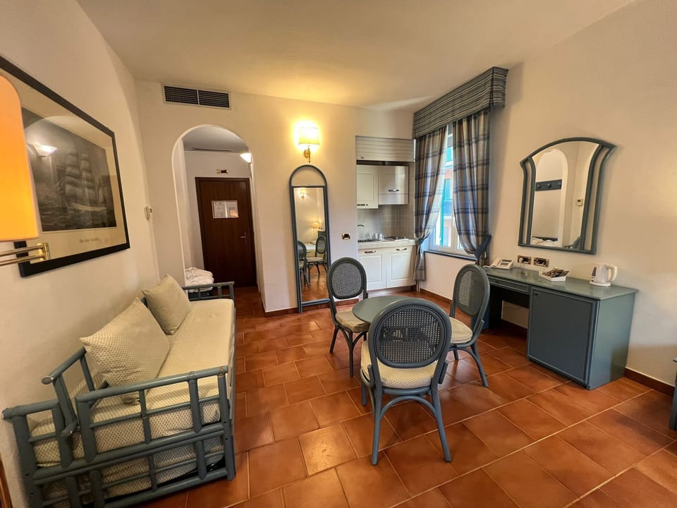 Family Room | Down comforters, minibar, in-room safe, desk