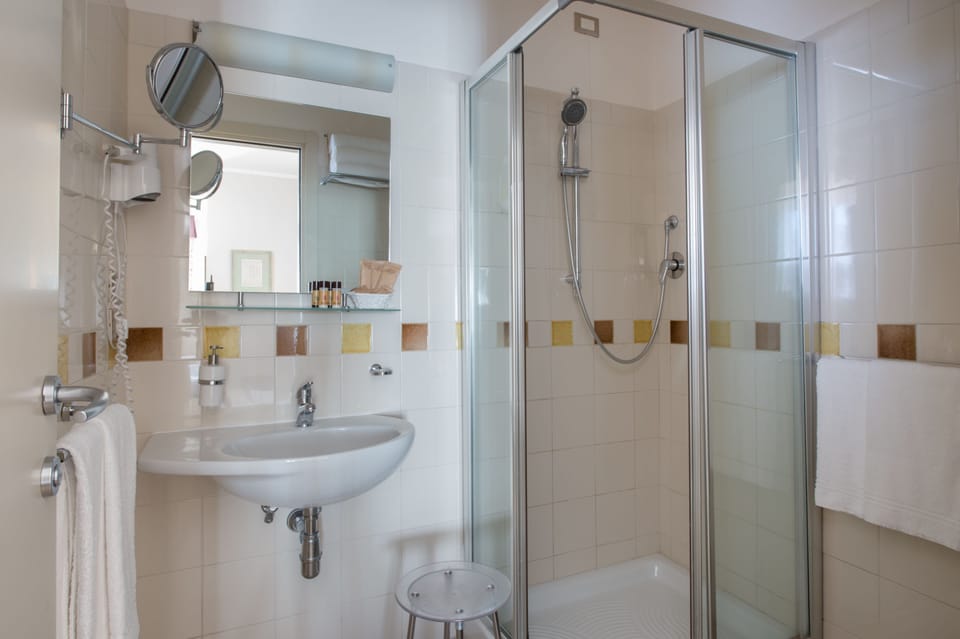 Shower, free toiletries, hair dryer, towels