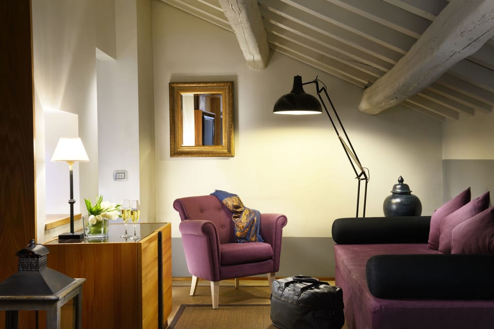 Suite (Rooftop) | Frette Italian sheets, down comforters, minibar, in-room safe