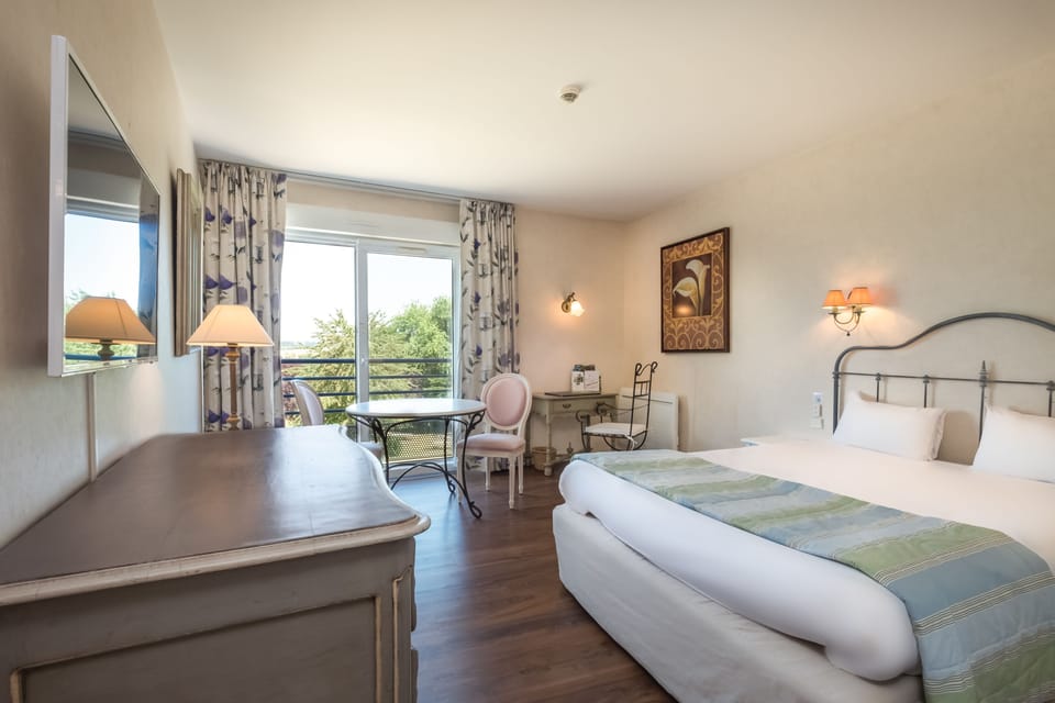 Superior Double or Twin Room | Minibar, in-room safe, desk, soundproofing