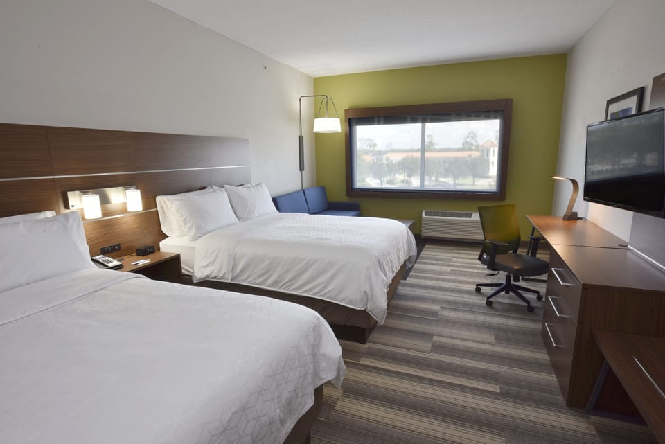 Suite, 1 Bedroom | Down comforters, pillowtop beds, in-room safe, individually decorated