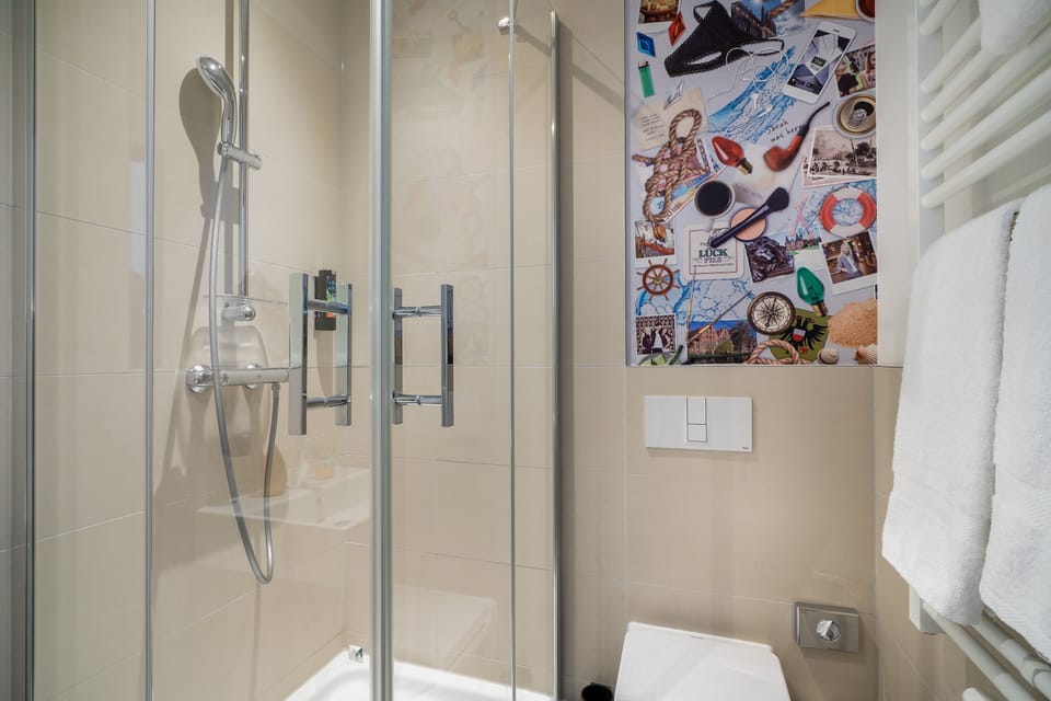 Shower, free toiletries, hair dryer, towels