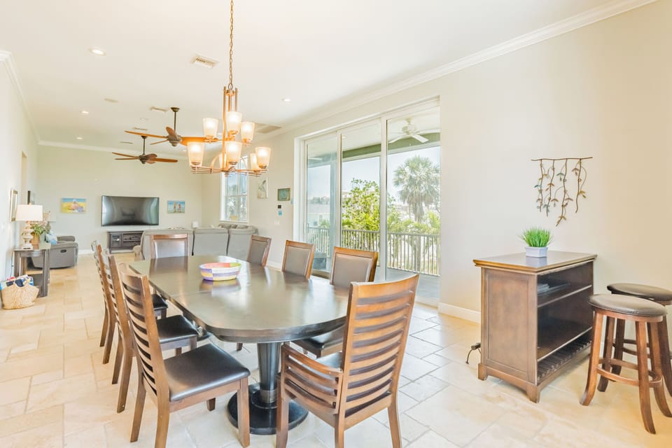Gather around the dining table for meals, board games, or planning your next beach adventure. The space is light-filled and welcoming, with seating for the whole group and a laid-back coastal feel.