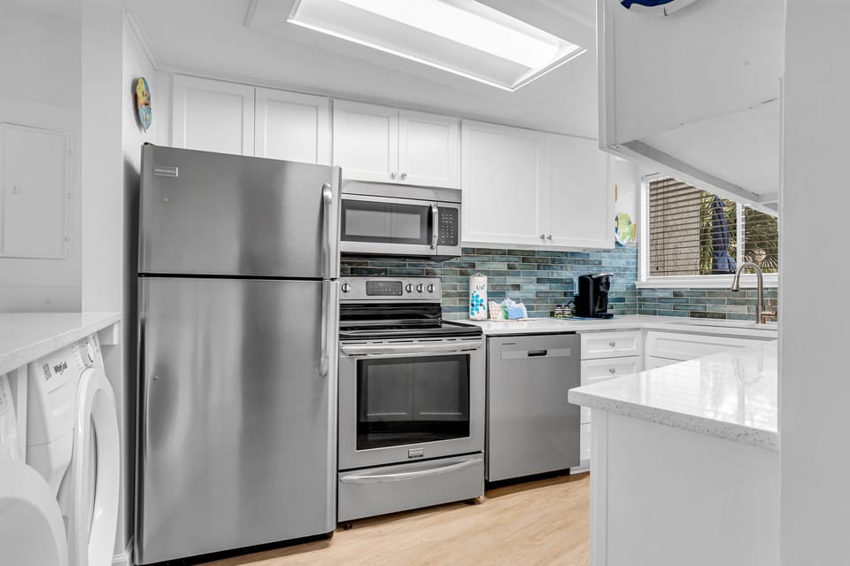 Renovated kitchen on 12/30/25 new quartz and backsplash