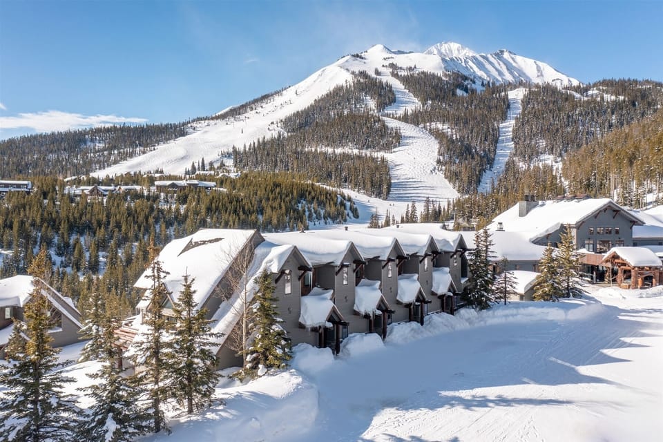 View of Saddle Ridge A building with Lone Peak & ski slopes in the background