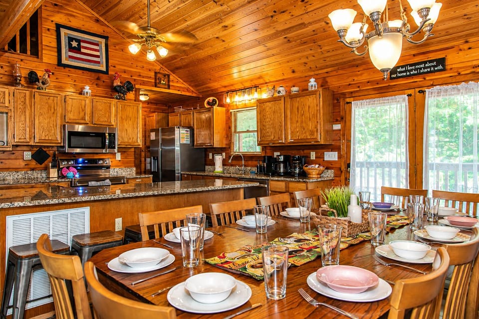 Main entry, open concept living/dining/kitchen. Large granite Island with stools