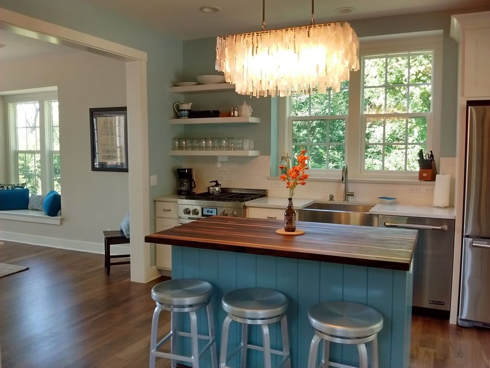 Fantastic Kitchen, Quartz Counters, Walnut Butcherblock Island, Capiz Chandelier